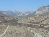 10-zoomed_view_looking_up_from_higher_vantage_point_on_Harris_Springs_Rd_to_Kyle_Canyon