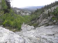 48-small_natural_spring_flowing_down_rock_to_aspen_grove