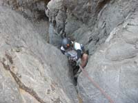 31-Laszlo_squeezing_down_to_start_the_rappel