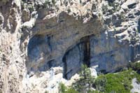 43-zoom_view_of_water_dripping_from_limestone_cliff,soon_a_cave_will_form