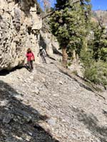 28-looking_back_to_Rozi_and_I_traversing_bottom_of_cliff_band-from_Laszlo