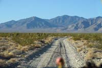 01-heading_up_Forest_Service_Rd_553(W_of_Creech)to_out_there_and_behind_that_peak_in_center