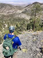30-Kevin_contemplating_route_down-from_Laszlo