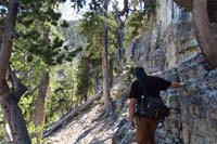 38-Brett_following_base_of_cliff_band_looking_for_a_break