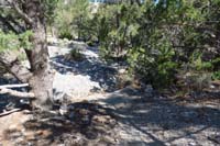 13-continue_across_well_defined_trail_through_washed_out_cairned_sections