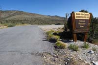 01-sign_from_Kyle_Cyn_Rd_to_trailhead_parking,dirt_road_for_trail_about_250_ft_up_at_left