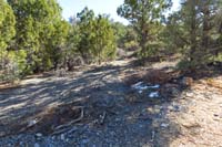 35-looking_back_at_Mud_Springs_27-not_easy_to_notice_the_path,small_cairn_to_R_helps