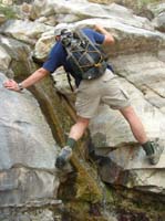 025-Jim_climbing_over_the_waterfall