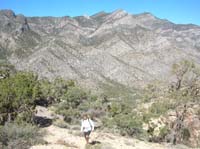27-Peppe_and_I_heading_down_North_Peak_trail-La_Madre_Mountains_in_background