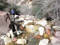 08-Larry_with_colorful_rocks_to_boulder_hop