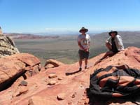 24-Mike_and_I_on_Mescalito_Peak-Calico_Hills_in_background_left_and_Las_Vegas_Strip_between_us