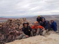 08-Crabby_Appleton_Peak_summit_photo_with_Magic_Mountain_in_background-me,Luba,Rich,Ed,Richard