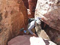 23-keyhole_Peppe_found_to_get_through_and_down_to_Calico_Basin-only_way_down_from_slot_canyon