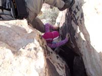 04-Kenny_picture-Daddy_uses_his_legs_as_holds_for_Sarah_to_climb_a_rock