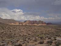 33-1425pm-view_from_4771_Overlook_toward_Calico_Hills-sun_coming_out