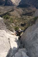24-Greg_scrambling_up_break_in_cliff-noted_waypoint_this_time