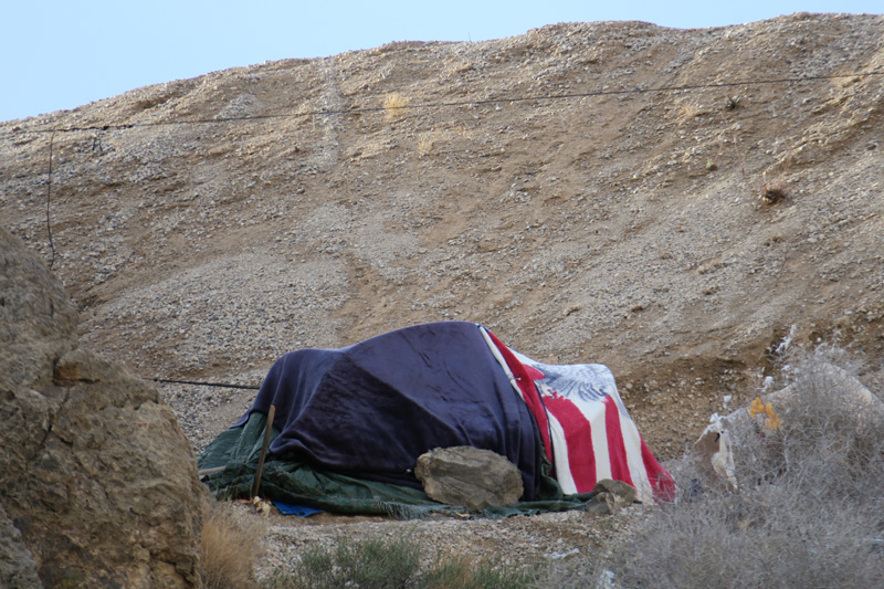 03-zoom_of_homeless_camp-hell_of_a_rock_to_have_moved_to_secure_tent