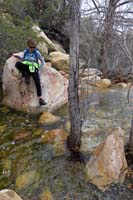 12-carefully_scrambling_rocks_and_not_falling_into_the_water