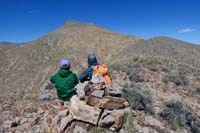 32-Ed_and_Luba_taking_a_break_admiring_the_ridgeline_ascent_to_the_peak