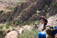 09-Richard_throwing_down_the_rope_and_bag-240_foot_rappel