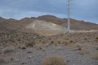 03-Lonely_Pinon_Mountain_in_the_distance,we_pass_by_the_gravel_quarry