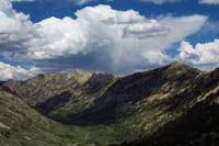 47-rainstorm_over_mountains-our_campsite_is_on_other_side_of_ridge_to_right
