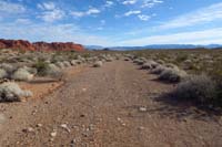 29-trail_merges_with_dirt_road_which_leads_to_main_paved_road_in_other_direction