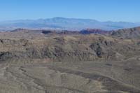 19-scenic_view_from_peak-looking_E-zoom_view_towards_Valley_of_Fire_and_distant_Gold_Butte_NM