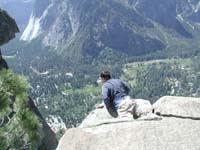 11-Chris_looking_over_long_drop_from_top_of_Yosemite_Falls