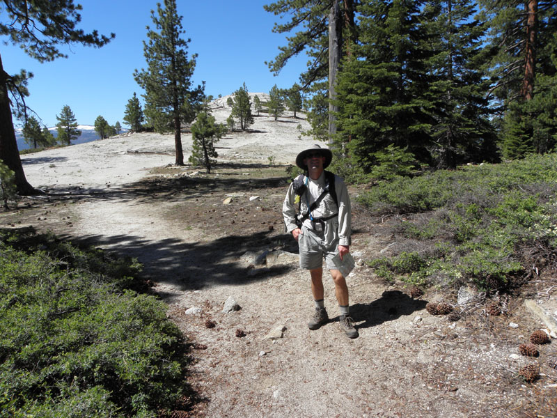 16-me_on_the_trail_towards_North_Dome-little_shade_for_a_while-about_mid-80s_at_elevation-hot_for_hiking