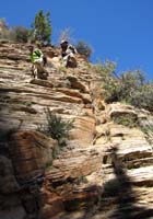 70-Ali_and_I_coming_down_brittle_sandstone-almost_like_steep_steps-from_Jenn