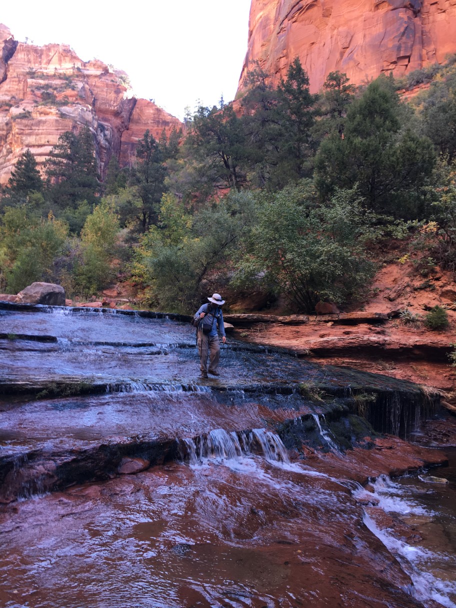 054-me_walking_along_cascading_watefall-from_Gertrude