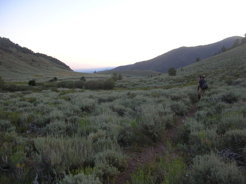 01-45_minutes_into_the_hike-Joel_and_Jose_enjoying_the_sunrise_views_of_sagebrush_fields