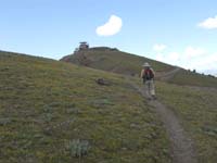 24-me_on_that_trail_with_peak_in_background-from_Joel