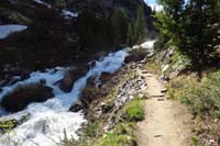 50-trail_along_cascading_waterfall