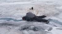 052-Daddy_sips_fresh_glacial_water-drinkable_since_past_snowcoach_pollution_potential
