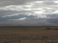 48-neat_clouds_covering_mountains_with_light_shining