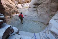 27-Ed_moving_on_to_the_next_rappel-very_short,could_slide_and_jump,but_possible_spinal_compression_injury