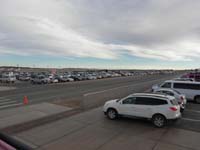 26-sun_set_in_1.5_hours-parking_lot_full-cars_still_driving_in-they_will_leave_in_dark