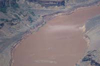 18-river_rafters_approaching_cliff_landslide_area_with_another_smaller_landslide