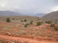 45-scenic_terrain_with_thunderstorms_in_distance