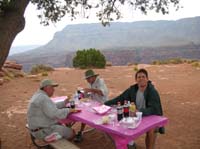 67-John_Neil_Chris_eating_lunch_on_picnic_table_near_edge