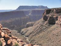 36-we_know_the_canyon_cliffs_out,but_we'd_like_to_reach_that_cliff_and_explore