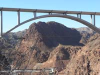 Hoover_Dam_and_bypass_bridge_from_Dam-morning04-20121031-zoomed_of_bridge_and_Peak_1940