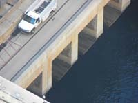 Hoover_Dam_and_bypass_bridge_from_Dam-morning07-20121031-zoomed_view_of_water_below_AZ_powerhouse