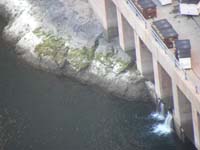 Hoover_Dam_and_bypass_bridge_from_Dam-morning11-20121031-zoomed_view_of_water_below_NV_powerhouse