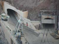 Hoover_Dam_and_bypass_bridge_from_Dam-morning13-20121031-NV_side_maintenance_tunnels