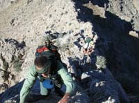 43-Greg_Joel_Alda_Sacha_on_sharp_ridgeline_with_steep_drop