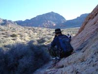 85-Sacha_admiring_scenic_shot_from_lone_sandstone_formation