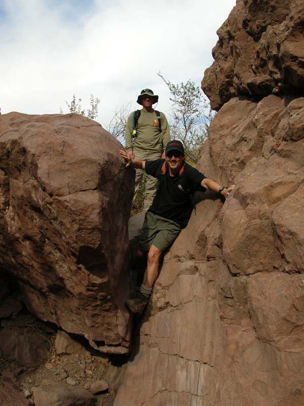 26-Mike_climbing_down_boulder